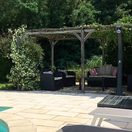 Pool pergola with sunloungers